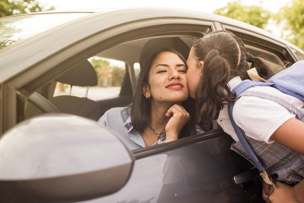 fort worth woman in car saying goodbye to daughter