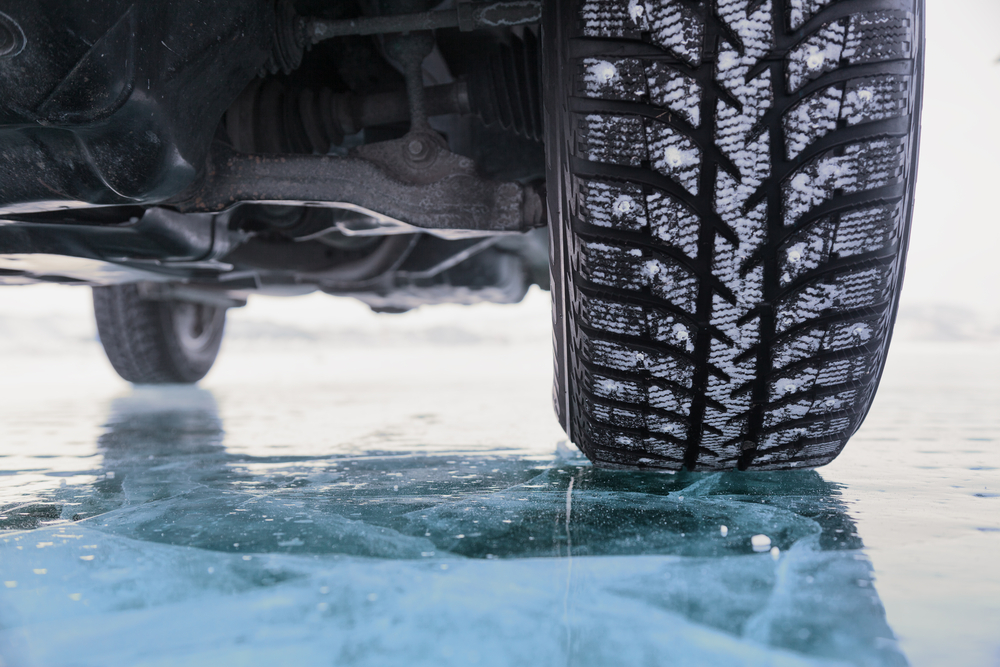 tires over ice on road