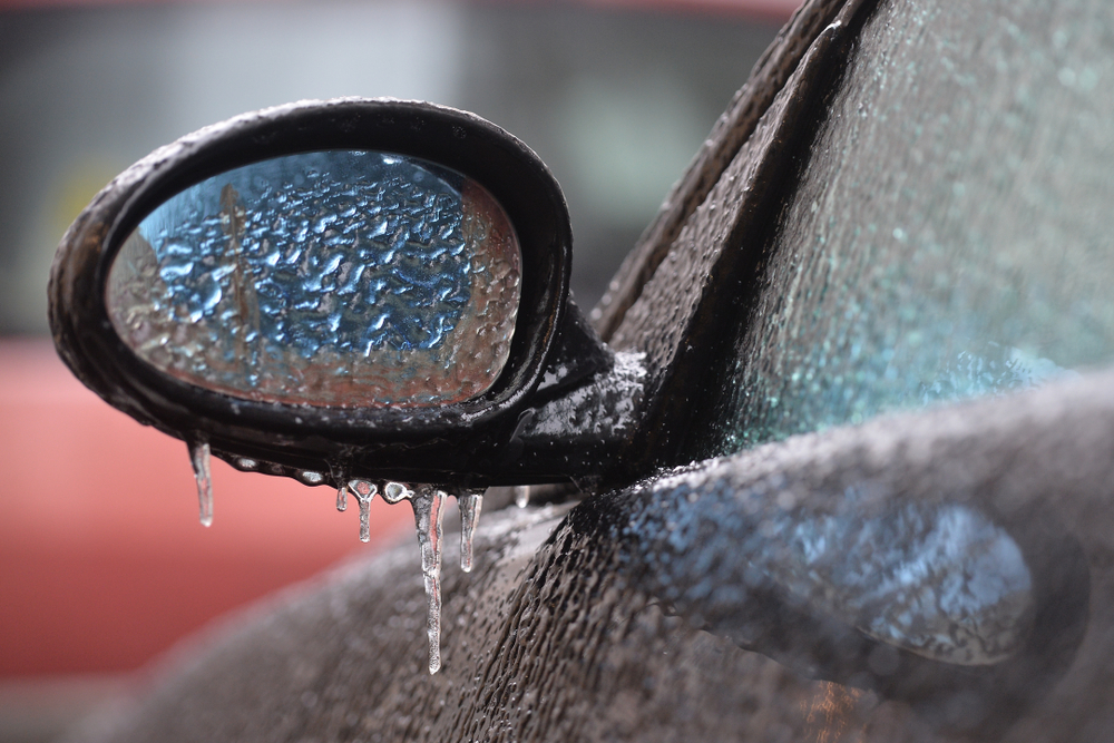 freezing rain in dallas, iced over mirror on car